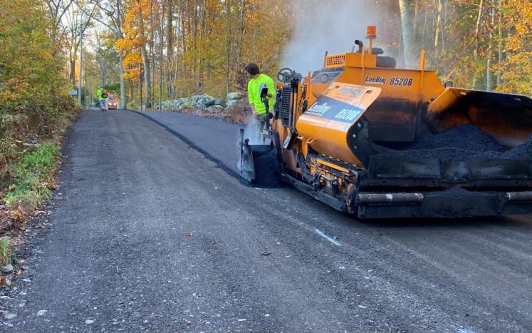 Paving of the roadway.